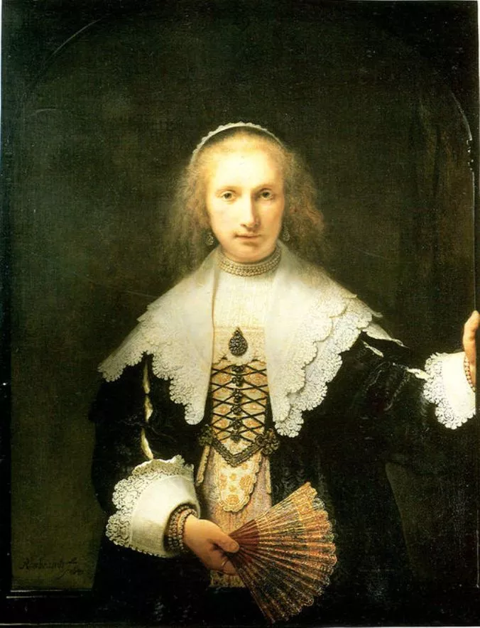 Close-up of Agatha Bas’s face and fan, highlighting Rembrandt’s handling of light and texture.